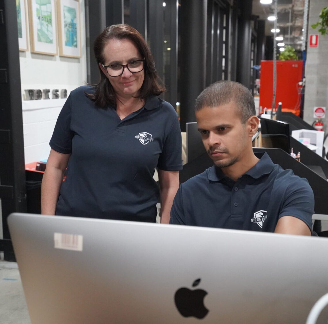 Cyber incident response planning meeting at Siege Cyber Brisbane office