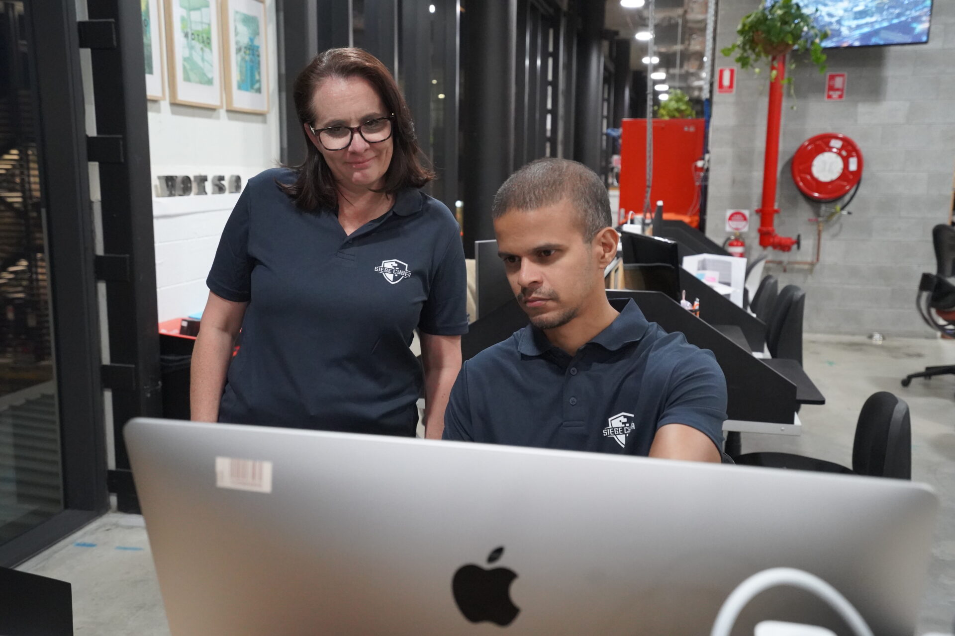 Cyber incident response planning meeting at Siege Cyber Brisbane office